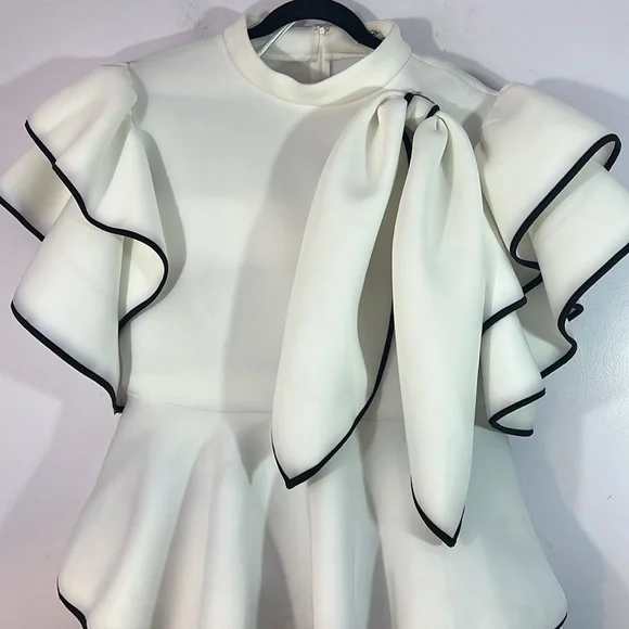 Wowza this is unique!  XXL black and white two piece outfit, WHY